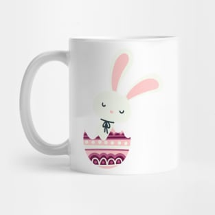 Easter rabbit in a pastel pink and maroon egg shell. Mug